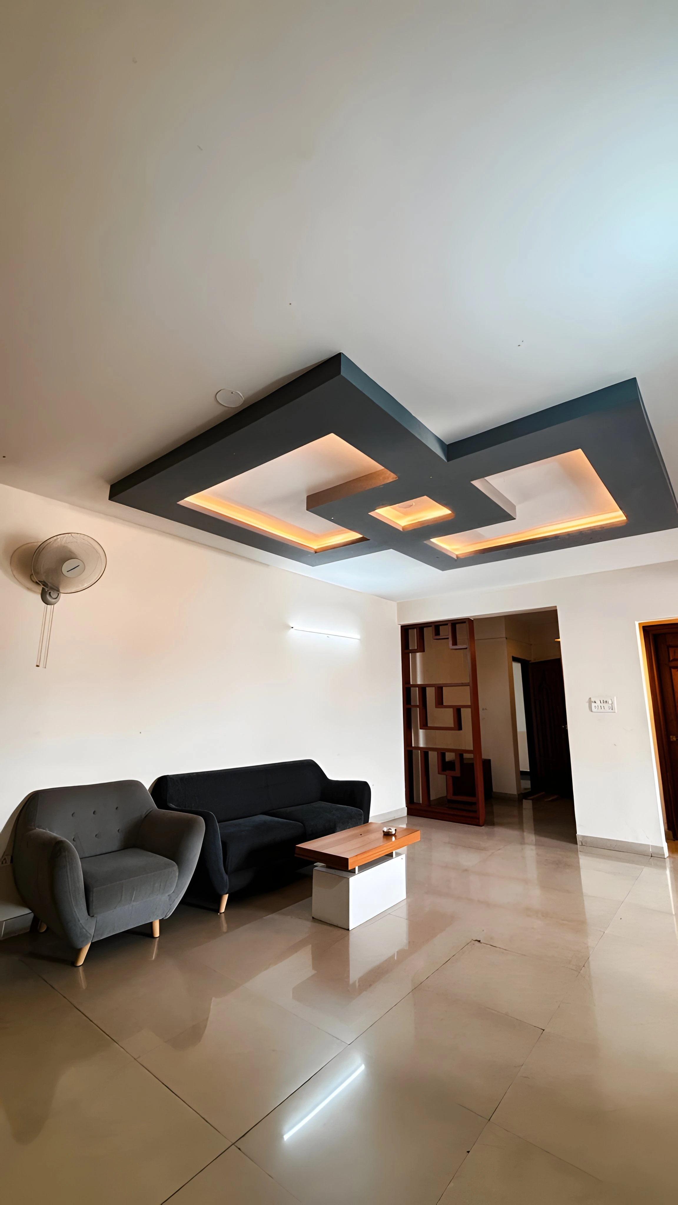 Modern living room with dark seating