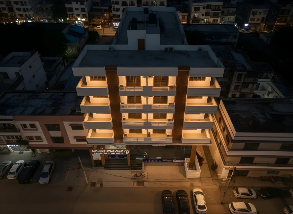 Oakhaven service
                                apartment in BTM-Layout building exterior at night